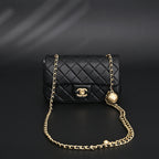 Chanel Classic Flap Mini Bag – Black Quilted Lambskin with Gold-Tone Hardware